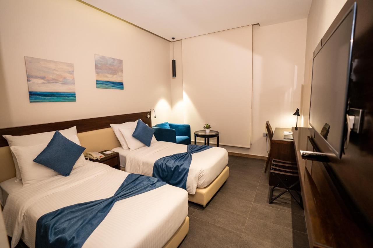 The Compass Hotel Amman Exteriör bild